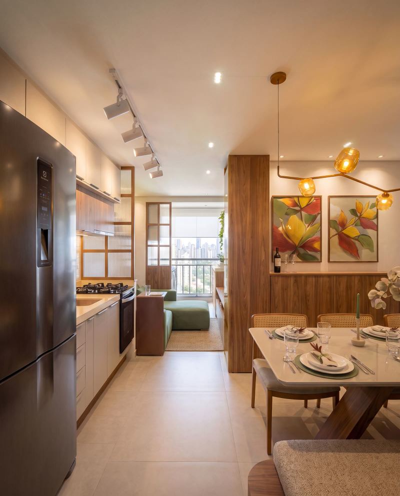 Apê Terranoá: cozinha linear integrada ao jantar, com vista para a varanda e a cidade